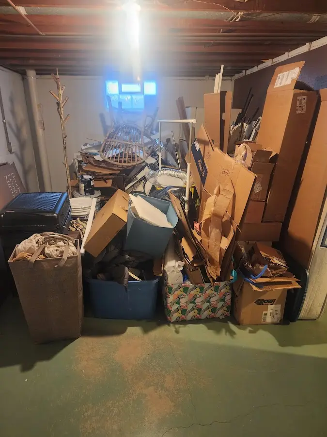 Roll-off dumpster container at job site for Construction Dumpster Rental in Sappington